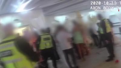 Body-worn camera footage of police leading guests from the wedding reception