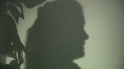 Silhoutte of woman speaking