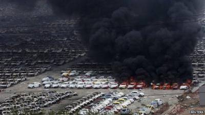 Black smoke rising from cars