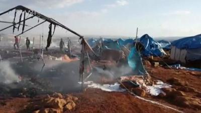 Still from amateur footage purports to show the aftermath of an air strike near Sarmada, Syria