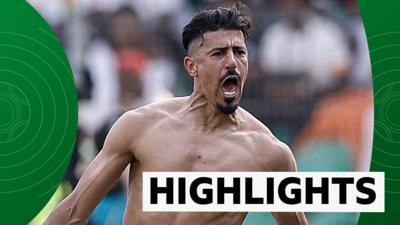 Algeria's forward Baghdad Bounedjah celebrates after scoring his team's second goal against Burkina Faso.