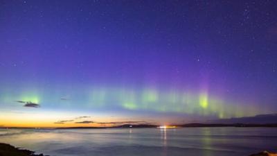 Aurora borealis in the night sky over Scotland.