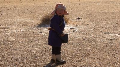 Child in desert