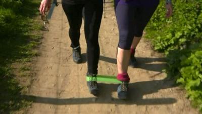 Claire and Charlie walking