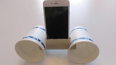 A smartphone speaker system made from a toilet roll and two cups