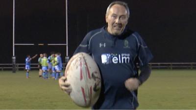 Andy running with large rugby ball