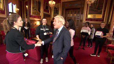 Speaker John Bercow meeting teenagers campaigning against abusive language in Parliament.