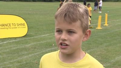 Young cricket player being interviewed