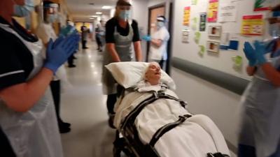 A 102-year-old leaving hospital