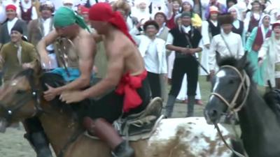 Horseback wrestling