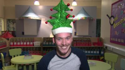 Martin wearing a Christmas hat