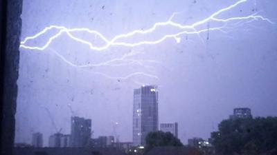 Lightning strikes tower