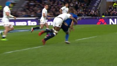 Courtney Lawes tackles Jules Plisson