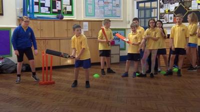 Children playing cricket