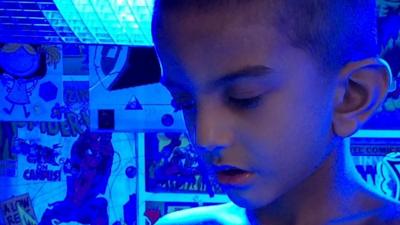 Ismail under UV lights