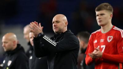 Rob Page applauds the crowd