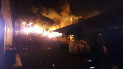 Large flames engulfed tents and prefabricated buildings in Moria camp