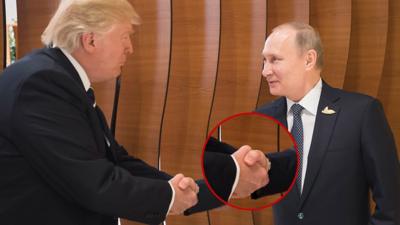 Two alpha males meet - but who had the dominant handshake and who couldn't maintain eye contact?