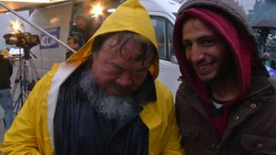 Ai Weiwei (left) with Syrian migrant Husan Jakal