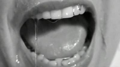 A woman screaming in a scene from Alfred Hitchcock's Pyscho