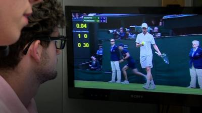 Tech experts look at tennis match on screen