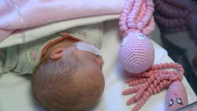 Baby with octopus