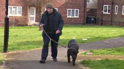 Man walking with dog