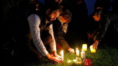 People with candles at the vigil for Sir David Amess MP, 16 October 2021