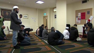 Muslims at prayer in a Christian church