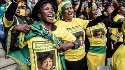 Mourners gather at the Olando Stadium in Soweto, outside Johannesburg