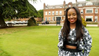 Professional golfer Nicola Bennett teaching school children golf