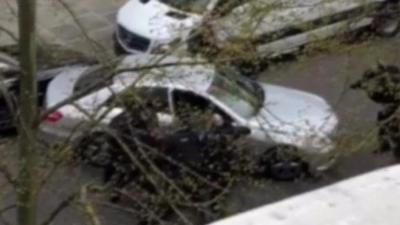 Police surround car outside Ukrainian Embassy in London