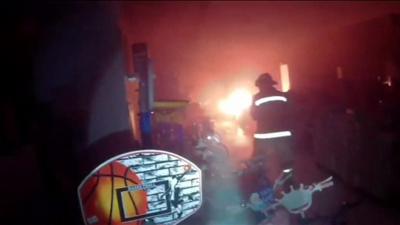 Still from firefighter's bodycam footage