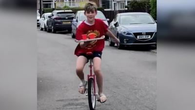 Finley Nash on his unicycle