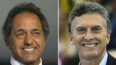 Pictures of the two leading Argentine presidential candidates: Daniel Scioli (left) and Mauricio Macri