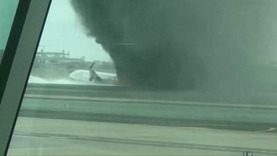 Plane on fire on the runway in Peru