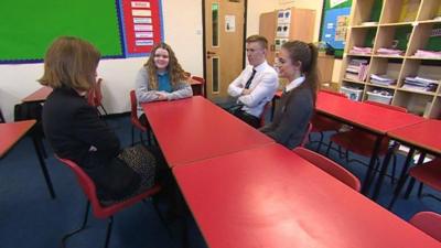 Exams watchdog says the Welsh Baccalaureate teaches "relevant skills" but needs to be simplified.