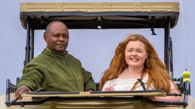 Lucy in the jeep on safari in Kenya.