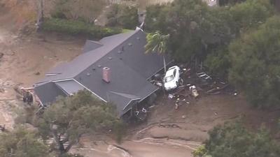 The mud and flooding is causing huge amounts of damage in Southern California.