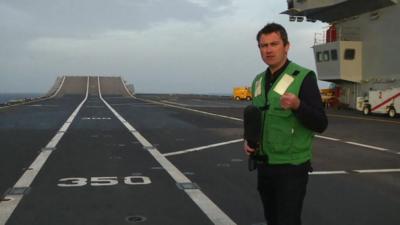 Ed Thomas on board aircraft carrier