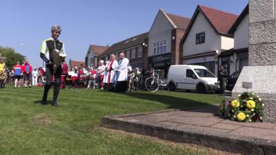 Cyclists at the memorial