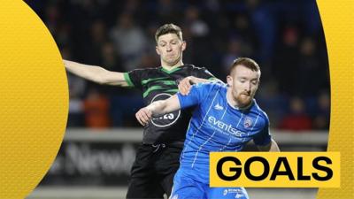 Coleraine's Rodney Brown challenges for the ball