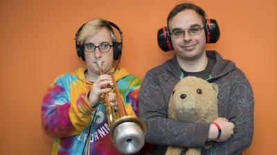 Robyn (left) Jamie (right) and a cuddly lion is in Jamie's arms