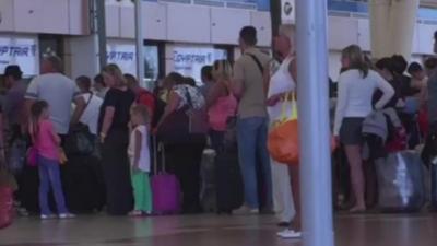 Queue of people in airport