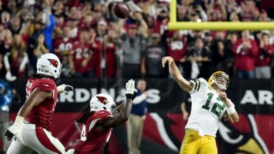 Aaron Rodgers throws an amazing Hail Mary pass for Green Bay Packers against Arizona Cardinals