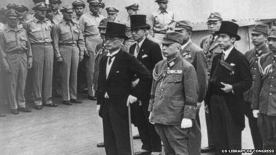 Japanese Foreign Minister Mamoru Shigemitsu (8-R) and Japanese General Yoshijiro Umezu (6-R) and the Japanese delegation aboard the USS Missouri for the signing the surrender documents on 2 September 1945