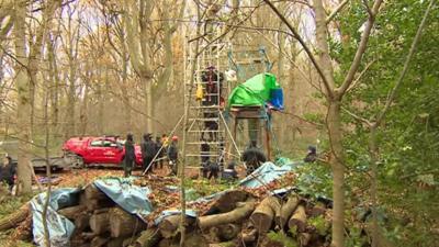 Protesters occupying an oil test site