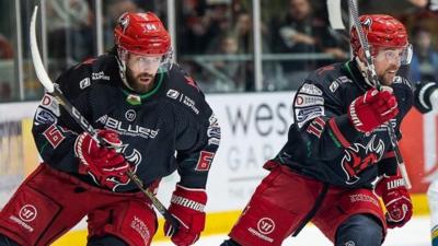 Jamie Arniel and Alderson of Cardiff Devils in action against Belfast Giants