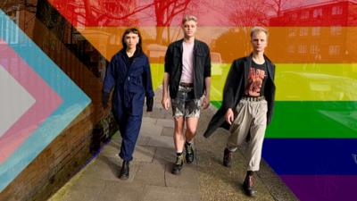 Organisers of Queer House Party walking down the street.