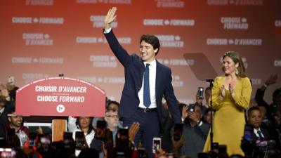 After winning a narrow election, Canada's prime minister celebrates with supporters in Montreal.